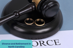 a gavel and a set of wedding rings - a concept for divorce and retirement in North Carolina