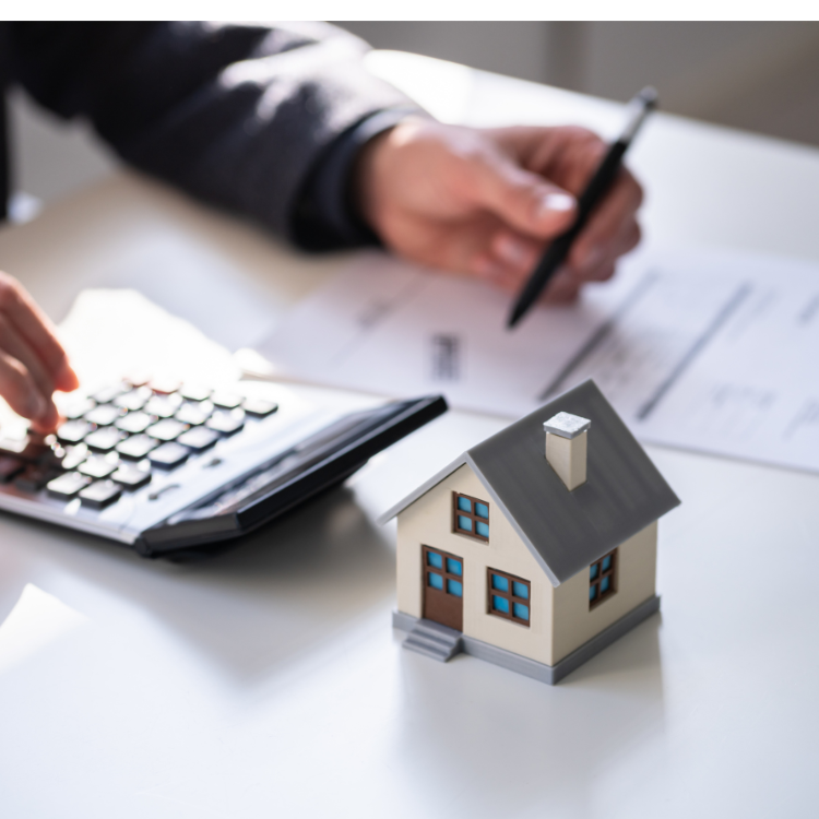 a house and a calculator, a representation of a high-asset divorce