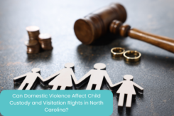 figures of family, gavel, and wedding rings on a table - a concept of child custody
