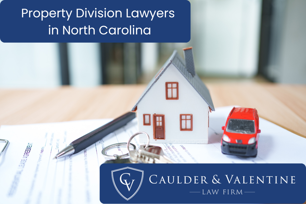 a pen, toy car and car keys, and a toy car - a concept for peroperty division lawyer in North Carolina