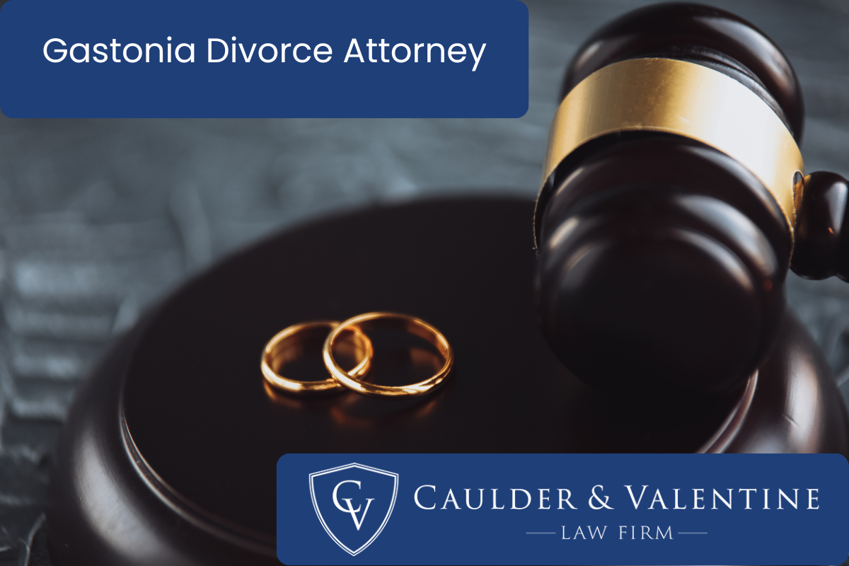 a gavel and a set of wedding rings - concept for divorce